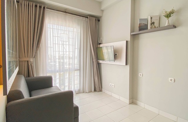 Homey And Modern 2Br At Patraland Urbano Apartment