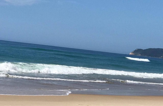 House next to the woods, beach and lagoon.
