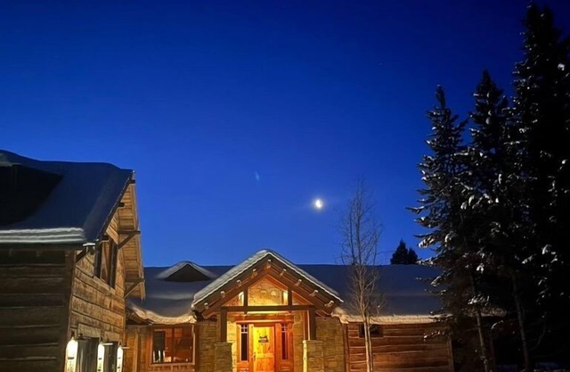 Ideally located stunning tranquil home in Big Sky! Overlooks Ousel Falls.