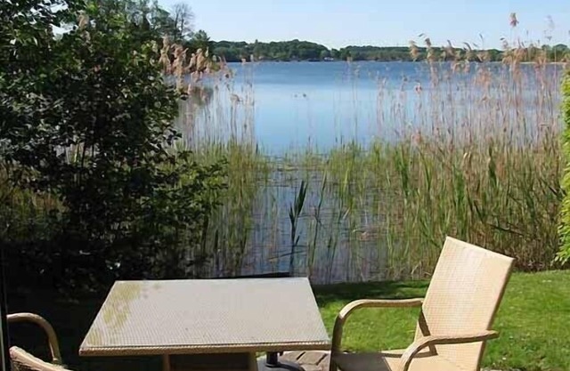 Idyllic holiday home in Timmdorf on a lake plot with its own lake access