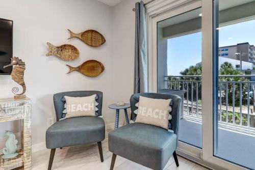 Ketch Courtyard Condo - Oceanview Balcony - Pool - Steps from the Beach