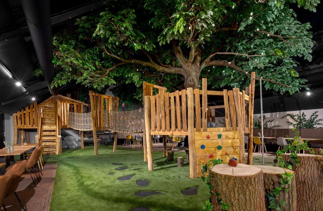 Kids lodge with dishwasher, on a holiday park in a green environment