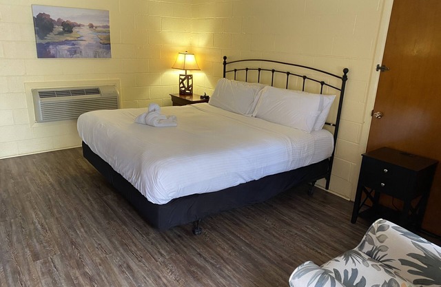 King Guest Room located at the Joplin Inn at the entrance to Mountain Harbor, just 2 1/2 miles from Lake Ouachita. by RedAwning