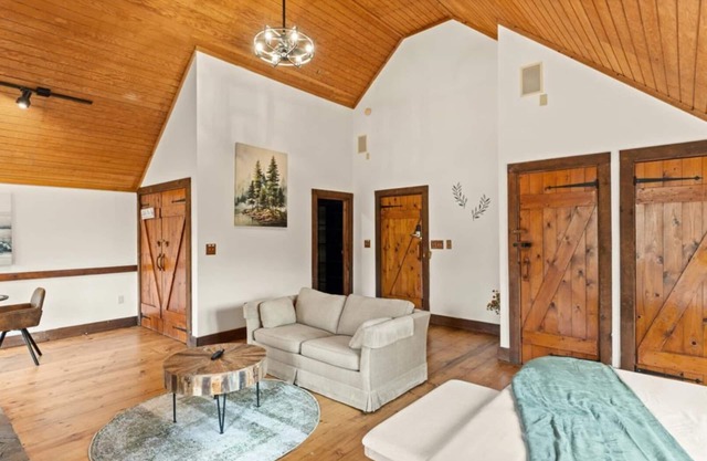 King Suite w/Skylights | Sofa Lounge | Balcony + Trees