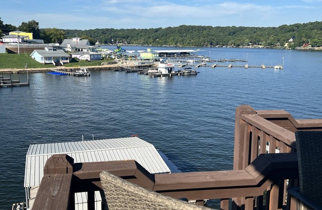 Lake front with orovate dock located in same cove as Coconuts!