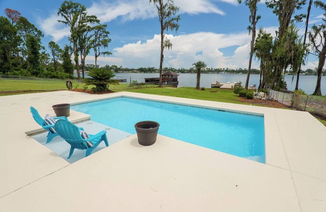 Lake House Pool Home With Dock and Boat Ramp