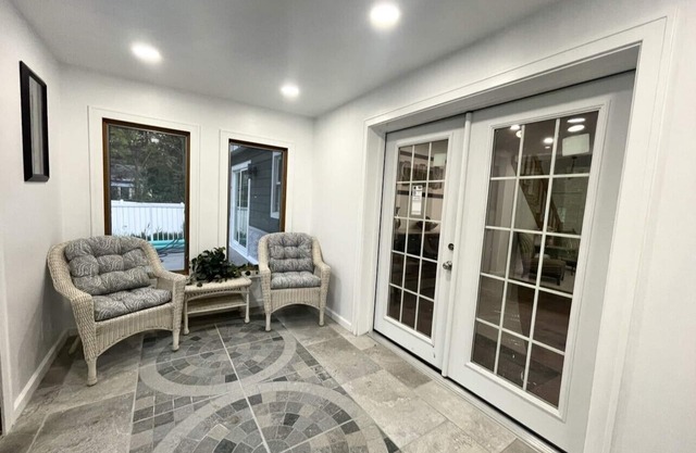 Lake Michigan Retreat. Spacious 4-bedroom home on wooded lot across from lake.