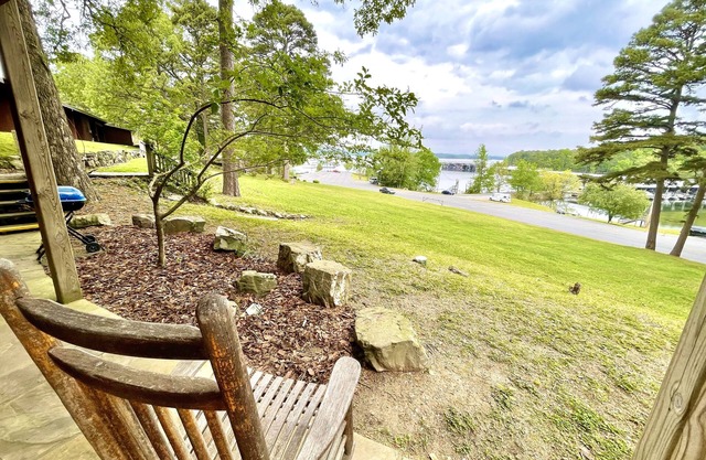 Lake view queen Guest Room with two queens, sleeper sofa and deck overlooking Lake Ouachita. by RedAwning