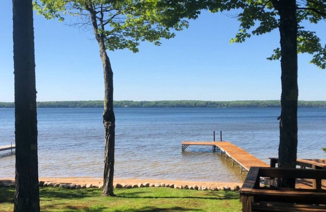 Lakefront, dog-friendly home with beach access, kayaks and firepit