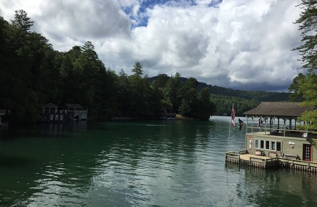 Lakefront home on Lake Rabun with huge boathouse and lots of patio space.