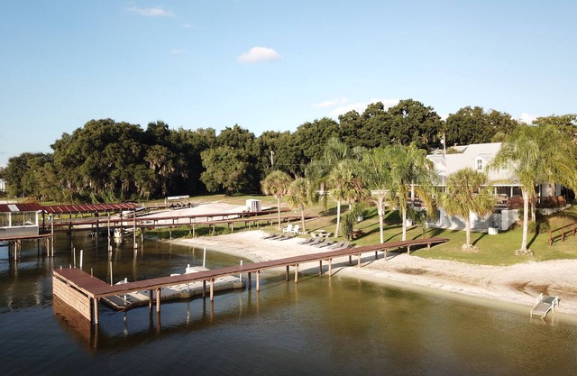 Lakefront Home w/Stunning Sunsets, Private Beach, Dock & Game Loft
