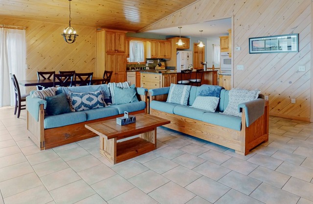 Lakefront home with dock, kayak, firepit, screened porch, fireplace, & W/D