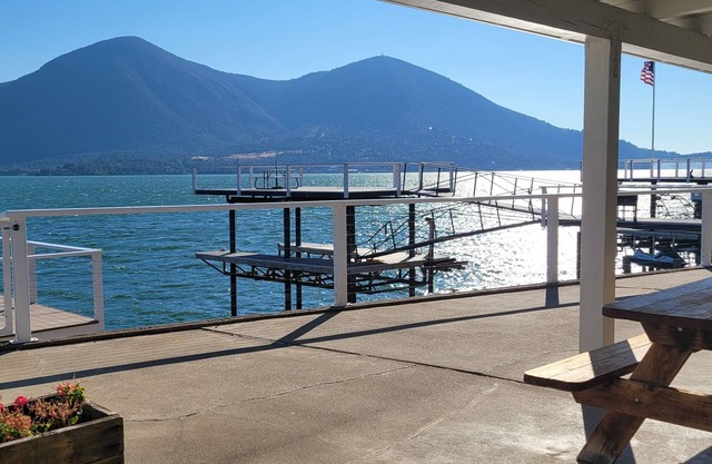 Lakefront home with patio, private boat dock and fishing pier