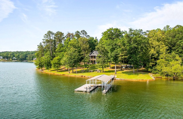 Lakefront home with private dock, kayaks/SUP, firepit, decks, & Ping-Pong