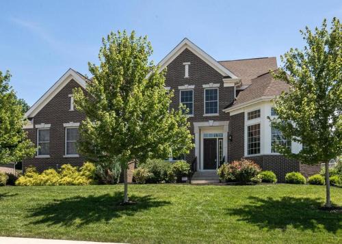 Lakefront view 5 bedroom home with basement