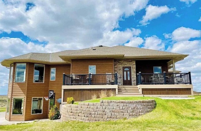 Large Bayside Golf Course home with Lake Views.