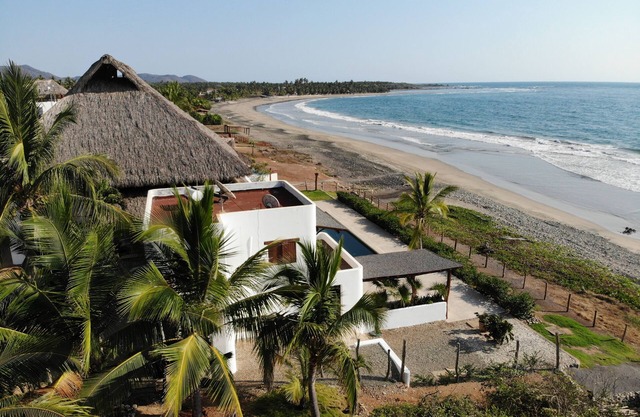 Large beach house sleeps 12, steps from the world-famous Saladita surf break.