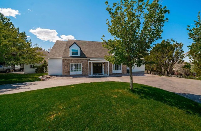 Large luxury home with a pool, playground & a view!