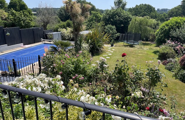 Large outstanding house, 20 mins from the beach with gardens, pool & hot tub