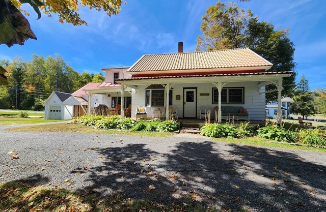 Large rustic home with gameroom. Near lakes, skiing, walk to downtown.