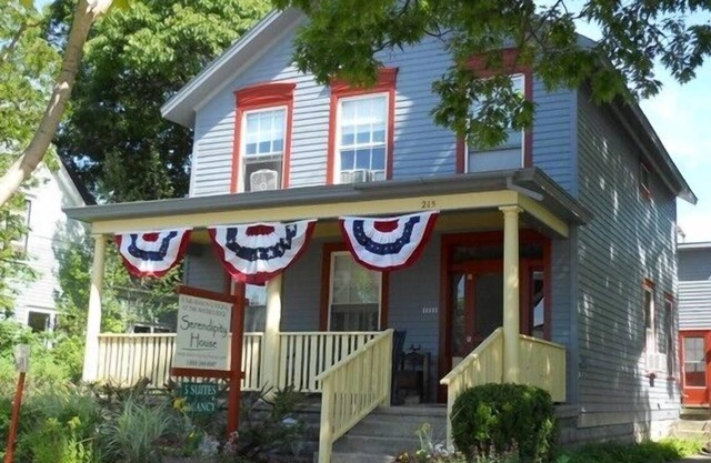 Large studio suite w/private back porch entrance one block from the beach.