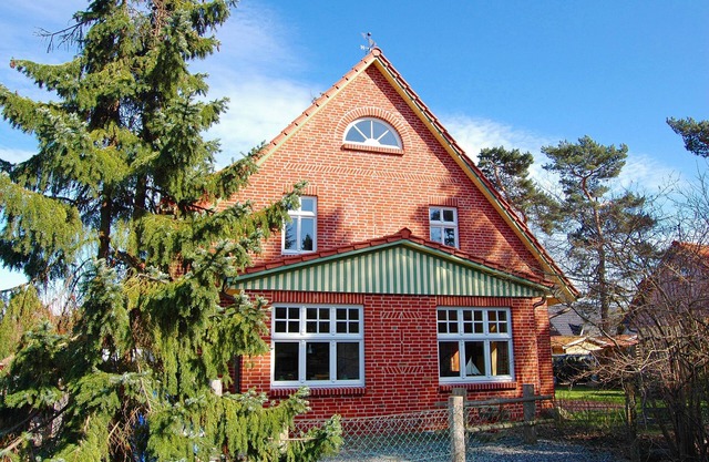 Live like a captain in an exclusive brick house by the Darßwald forest