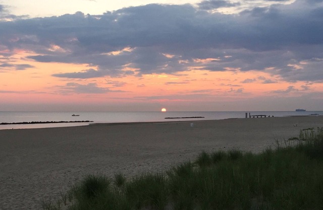 Live the "Life on a Sandbar" in a beachfront bungalow!nwith ODU Football Tickets