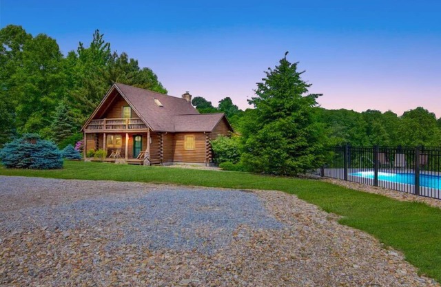 Lodge and carriage house with 7 combined bedrooms, ponds and private pool! Across from State Forest!