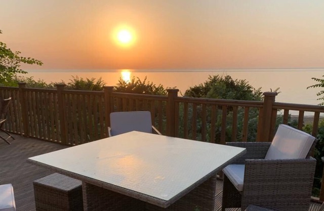 Lodge with decking and sea views at Azure Seas Park in Suffolk ref 32212OG