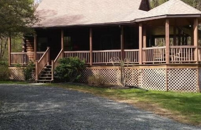 Log Cabin in Farm Country Setting