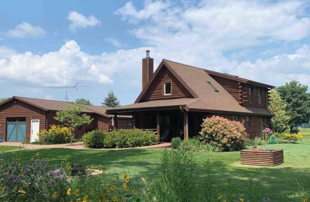 Log Cabin on the channel to Lake Poygan