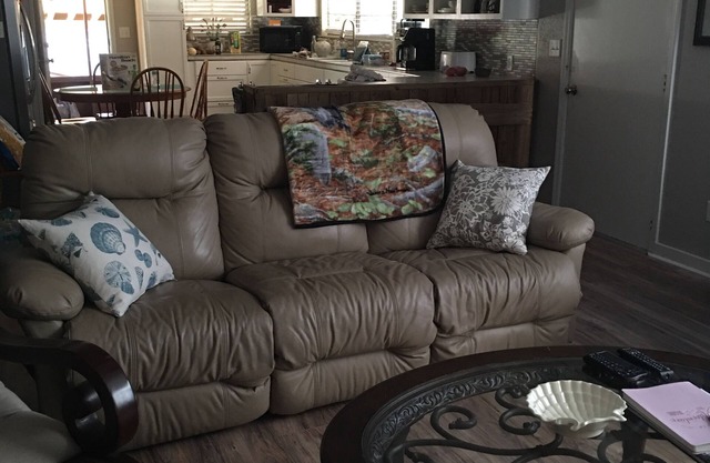 LOTS of parking for vehicles and boats. Large porch with swing and table, chairs