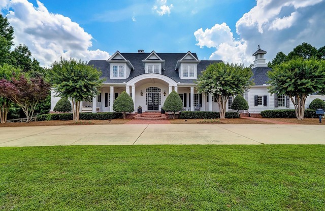 Luxurious 13,000 sq. ft. home: 7 private king suites, bunk room & movie theater