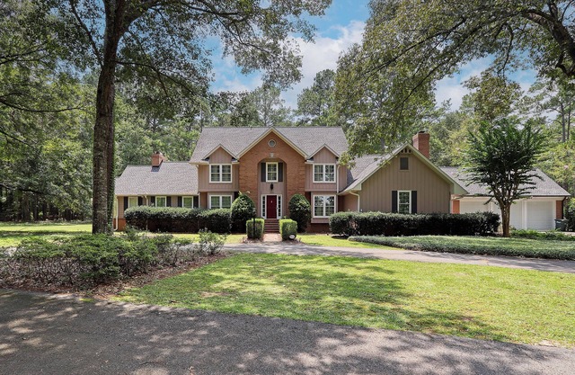 Luxurious 4-Bedroom Retreat with Theater, Pool, Hot Tub, and Bar on 6 acres.
