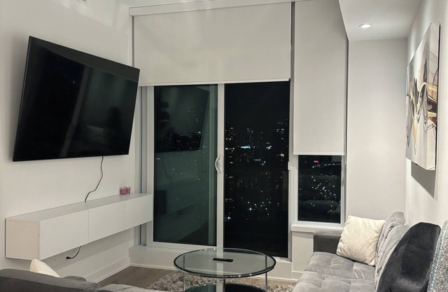 Luxurious High-Rise Condo with Stunning Waterfront Views