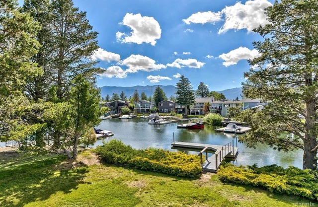 Luxurious Waterfront Retreat with Private Dock & H