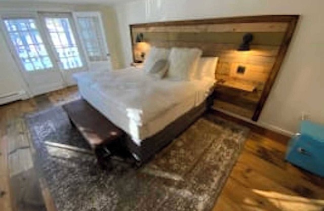 Luxury King Suite, Living Room w/sofa bed, balcony, & 1.5 baths