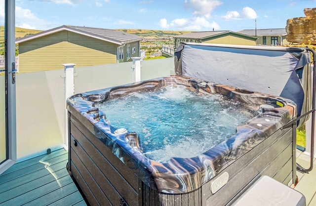 Luxury lodge with one double with en suite shower and one twin.