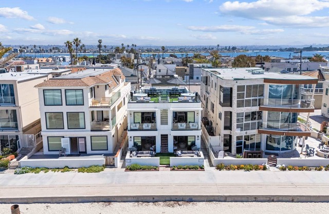 Luxury oceanfront fourplex with roof deck, sleeps 22