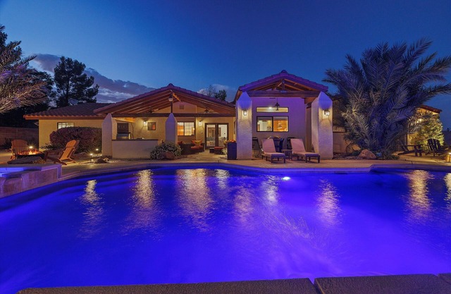 Luxury one level villa with pool and spa on 1/2 acre land
