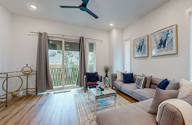 Luxury townhome with open-concept living space & gas fireplace