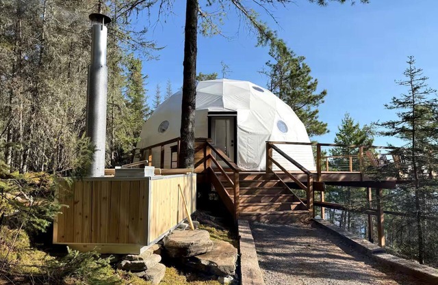 Luxury Treetop Glamping Dome with Private Hot Tub near Crane Lake, Minnesota