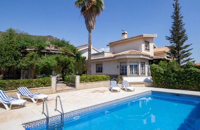 Magnificent villa with garden and pool.