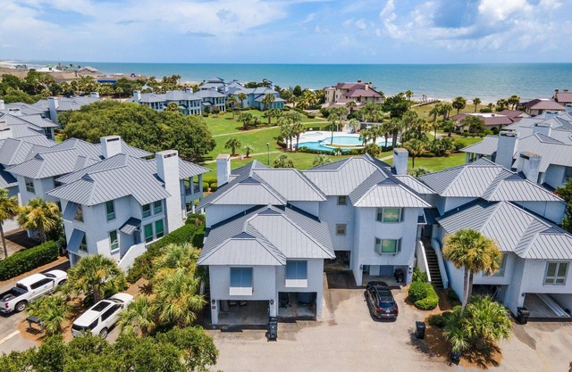 Memories Await, A Beautiful, Ocean View Villa featuring a wet bar, flat screens and wifi.