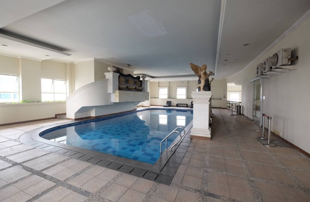 Minimalist and Cozy 2BR Apartment at The Boulevard