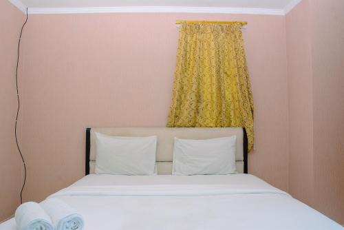 Minimalist and Cozy 2BR Apartment at The Boulevard By Travelio