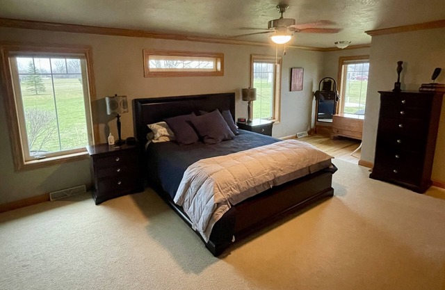 Minutes from EAA! Spacious 4BR home in a quiet neighborhood.