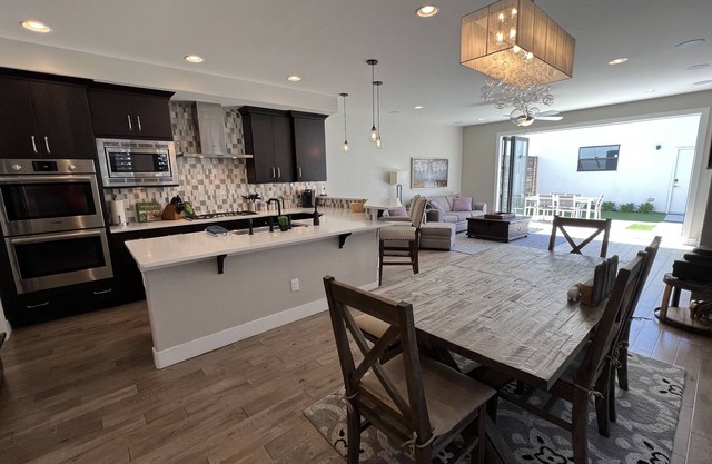 Modern 4-level home, 3500 sq ft, in the Highlands, 3 miles west of downtown.