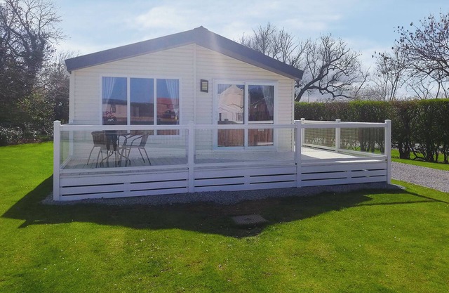 Modern and spacious holiday home with double and twin room.