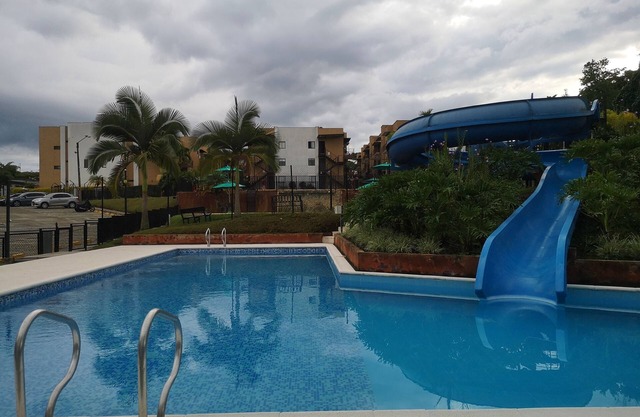 Modern apartment located in a resort style condo, pools, jacuzzi, soccer field,.
